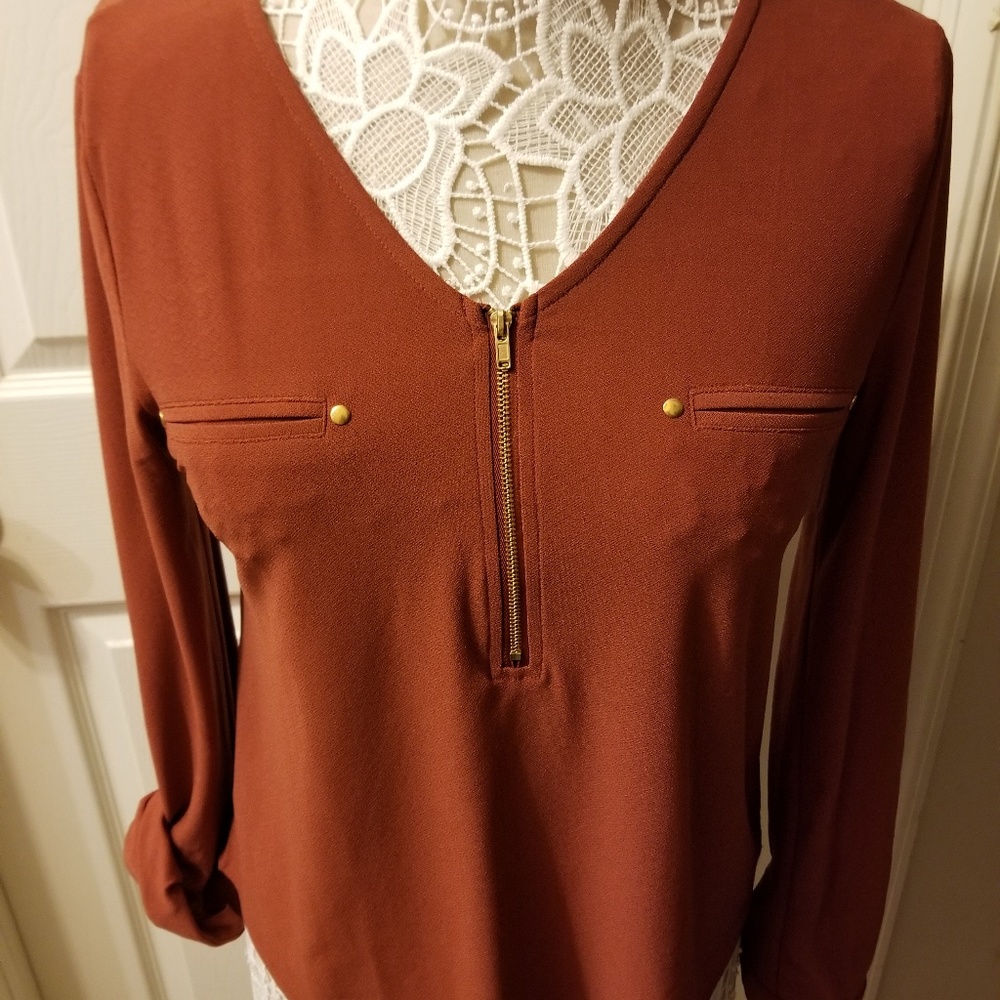 Rust colored blouse